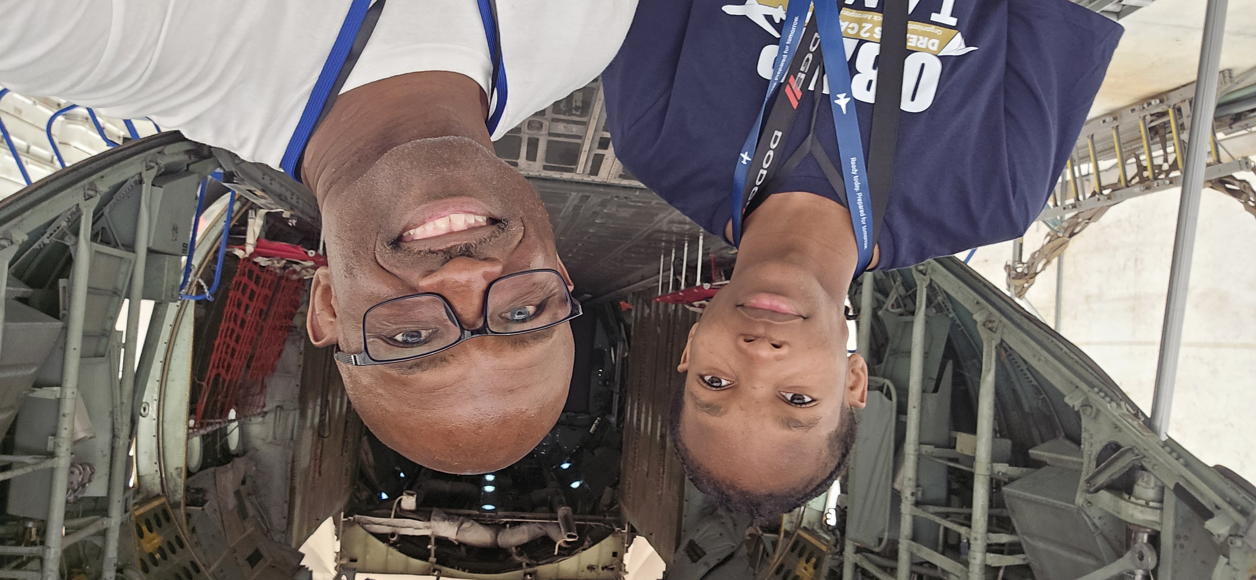 Mentor working with students at an aviation event